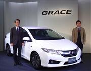 ホンダが発表したセダンタイプのハイブリッド車「グレイス」＝東京都港区