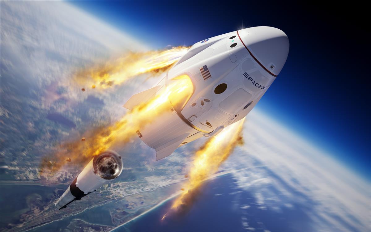 打ち上げ時に緊急脱出システムが作動し、ロケット「ファルコン9」から離脱する宇宙船「クルー・ドラゴン」のイメージ図（SpaceX）
