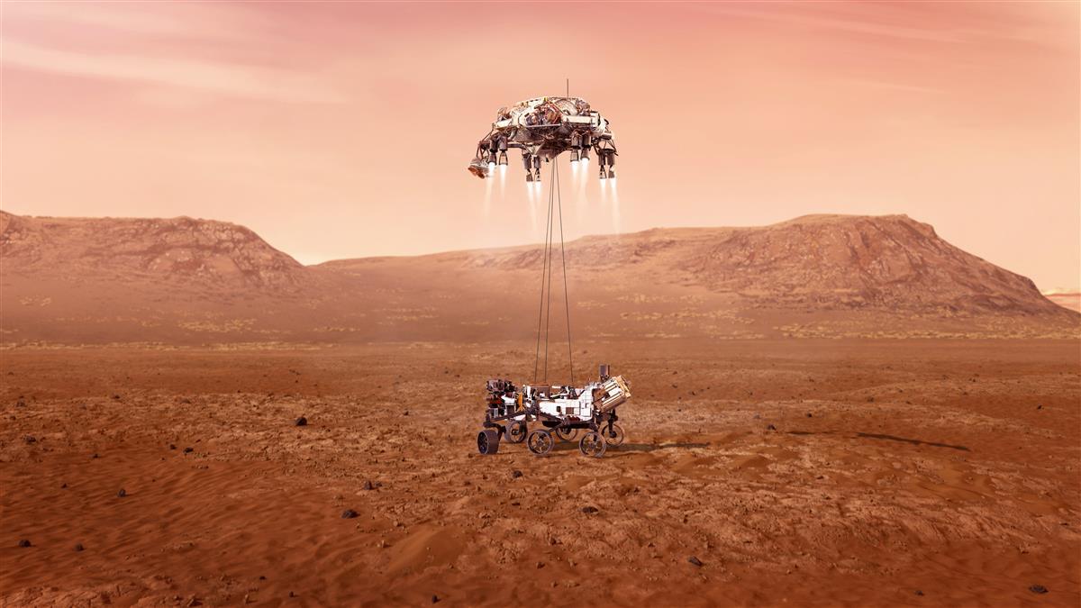 火星探査ローバー「パーセヴェランス」の着陸予想図。スカイ・クレーンがパーセヴェランスをクレーンで吊り下げ、火星にタッチダウンさせる（NASA/JPL-Caltech）