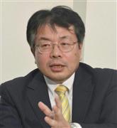 インタビューに答えるルネサスエレクトロニクスの鶴丸哲哉社長＝２１日、東京都千代田区