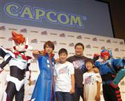 カプコンの子供向け新作ゲーム「ガイストクラッシャー」をＰＲする、タレントの佐々木健介さん（右から３人目）ら＝２日、東京都港区（米沢文撮影）