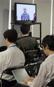 記者向けに公開された東京電力株主総会のテレビ画像。総会の冒頭、広瀬直己社長が話をする＝６月２６日、東京都渋谷区の国立代々木競技場 第一体育館（早坂洋祐撮影）