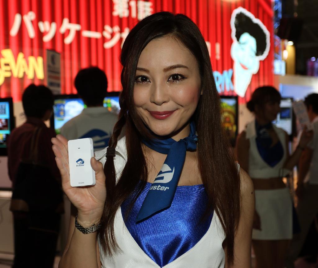 東京ゲームショウ２０１３。週末コンテンツ「コンパニオン特集」Ｇ－ｃｌｕｓｔｅｒの女性＝１９日、千葉市の幕張メッセ（小野淳一撮影）