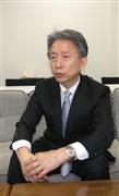 インタビューの質問に答える東京電力福島復興本社の石崎芳行代表