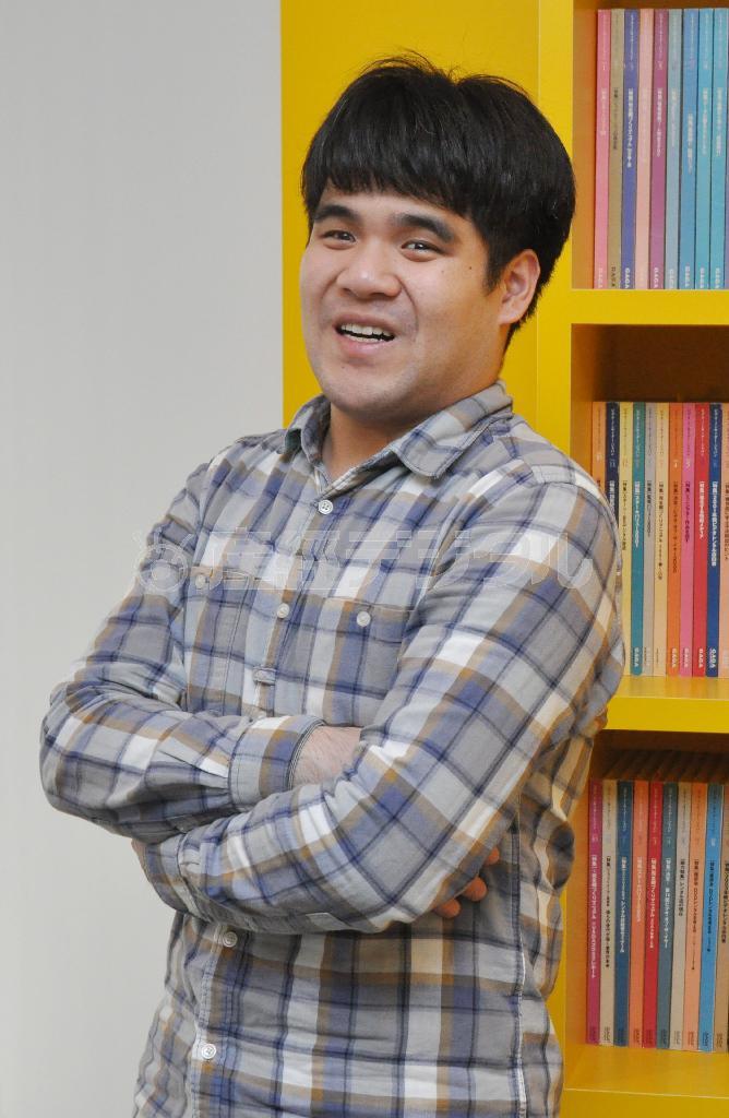 「音楽で世界のあらゆる色を感じ取ることができる」と語る、目の不自由なピアニストのホアン・ユィシアンさん＝２０１４年１月１４日、東京都渋谷区（伴龍二撮影）