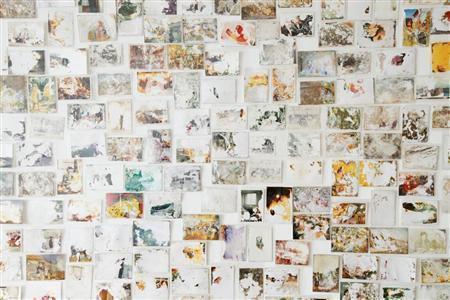 丁寧に洗われ、データ化された写真たち。誰かの生の痕跡が確かにそこにある（高橋宗正さん撮影、提供写真）