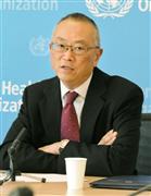 ３０日、ジュネーブで記者会見するＷＨＯのフクダ事務局長補（共同）