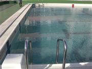 マグクリーンＳＰ投入前のプールの水は緑色に濁っていた（写真下）が、投入後はきれいに保たれた