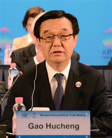 ＡＰＥＣ貿易相会合が閉幕し、共同記者会見に臨む中国の高虎城商務相＝１８日（共同）