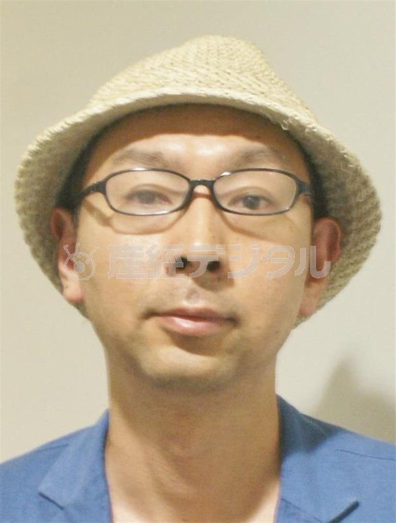 「日本全国パンの聖地を旅する＿パン欲」の著者、池田浩明さん＝２０１４年５月１５日（塩塚夢撮影）