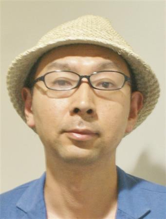 「日本全国パンの聖地を旅する＿パン欲」の著者、池田浩明さん＝２０１４年５月１５日（塩塚夢撮影）