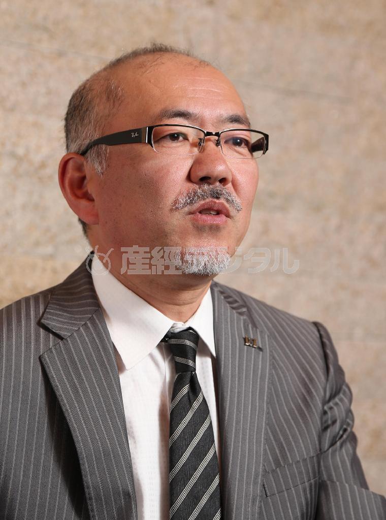 「懐かしくて新しい手作り洋食を提供し、京都らしい“１００年企業”をめざしたい」と語る、伊藤英彰・代表取締役兼オーナーシェフ＝２０１４年５月１２日、京都市中京区（恵守乾撮影）