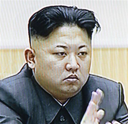 １２月１７日、金正日総書記死去から２年を迎え、北朝鮮の朝鮮中央テレビが放映した中央追悼大会の金正恩第１書記の映像（共同）