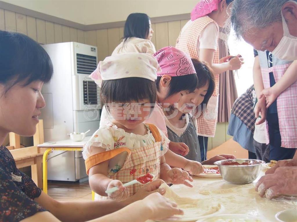 ピザで子供たちを笑顔に（提供写真）