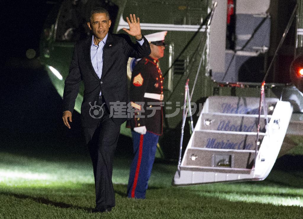 過激派「イスラム国」への対応などを協議したＮＡＴＯ（北大西洋条約機構）首脳会議から帰国したバラク・オバマ米大統領＝２０１４年８月５日（ＡＰ）
