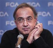 記者会見するフィアットのセルジオ・マルキオンネ最高経営責任者（ＣＥＯ）＝２０１４年９月２６日、米ミシガン州（ゲッティ＝共同）