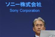 ２０１４年９月中間期の連結業績について記者会見に臨む吉田憲一郎ＣＦＯ＝３１日午後、東京都港区