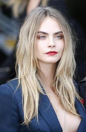 英モデル、カーラ・デルビーニュさん＝２０１４年９月１５日、英国・首都ロンドン（ロイター）