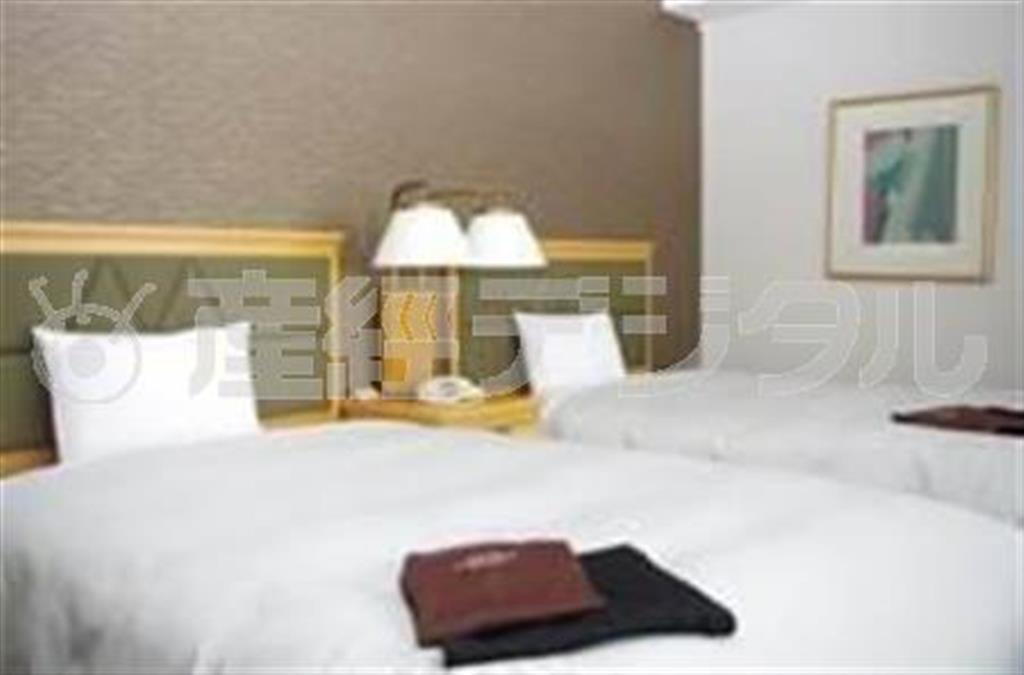 眠りの質にもこだわったベッドルーム（カンデオホテルズ提供）