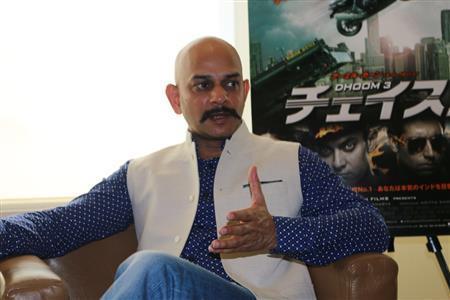 アクション映画の魅力を語るビジャイ・クリシュナ・アーチャールヤ監督＝２０１４年１０月３０日、東京都港区（高橋天地撮影）