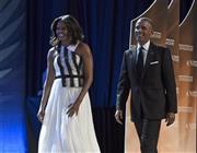 バラク・オバマ米大統領（右）とミシェル夫人＝２０１４年９月７日、米国・首都ワシントンン（ＡＰ）