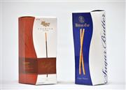 韓国ロッテグループの「プレミアペペロ」（左）と江崎グリコの「バトンドール」