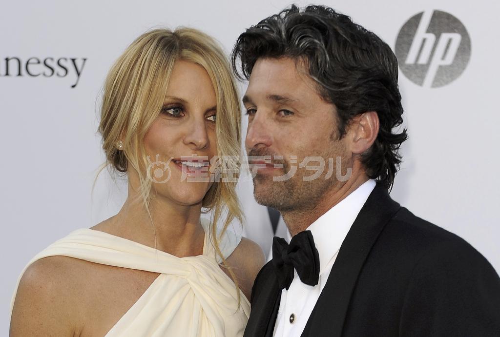 米俳優でレーシングドライバーのパトリック・デンプシーさん（右）と、妻のジリアンさん＝２０１１年５月１９日、フランス（ＡＰ）