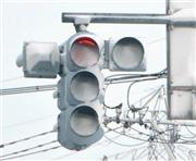 雪に覆われ、色が見えにくくなったＬＥＤ（発光ダイオード）信号機＝２０１４年１２月１８日、富山県富山市（共同）