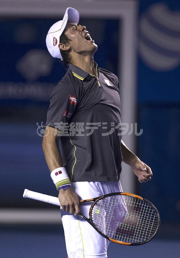 ケビン・アンダーソン（南アフリカ）を下して世界ランキング４位となり喜ぶ錦織圭（にしこり・けい）＝２０１５年２月２７日、メキシコ・ゲレーロ州アカプルコ（ＡＰ）