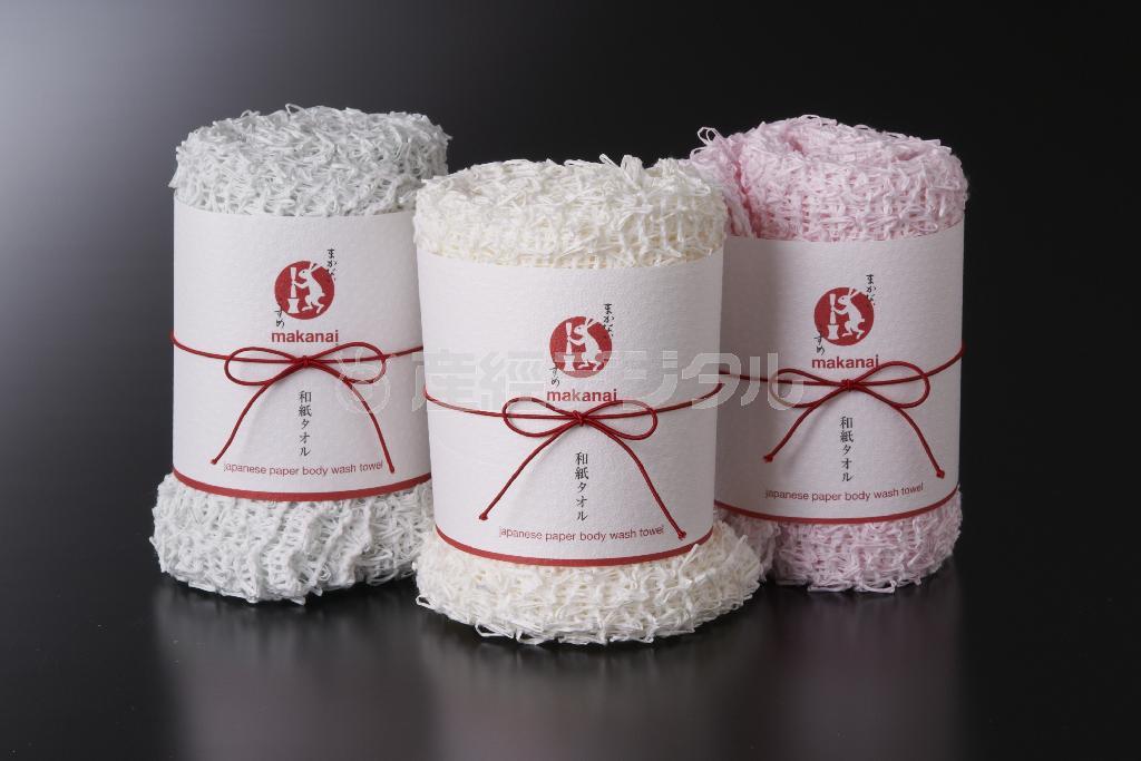【金賞】株式会社ディーフィット（まかないこすめ）／和紙タオル。和紙タオルは、こより状にした和紙と綿糸を熟練の技で編み上げ、肌をいたわる入浴シーンにとっておきの時間を運んでくる（提供写真）