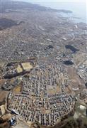 東日本大震災からの復興に伴う土地需要で、公示地価の上昇率が高い福島県いわき市。手前は上昇率が全国１位になった泉もえぎ台＝２０１５年３月１３日（共同通信社ヘリから撮影）