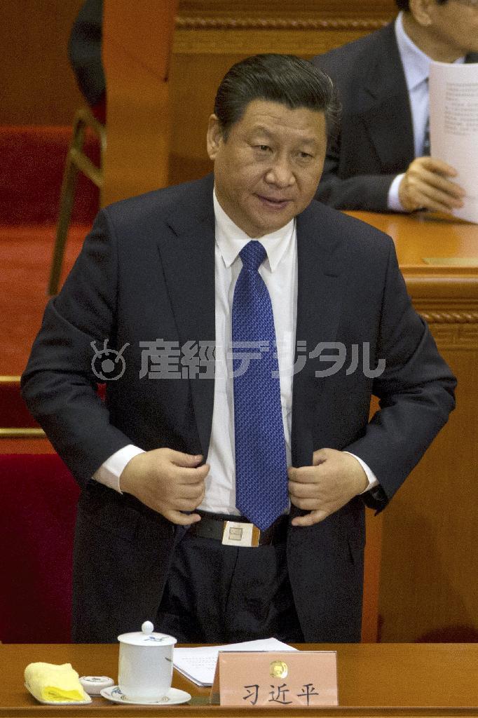 ３月３日の全国人民代表大会の開幕式に出席した習近平国家主席＝２０１５年、中国・首都北京市西城区（ＡＰ）