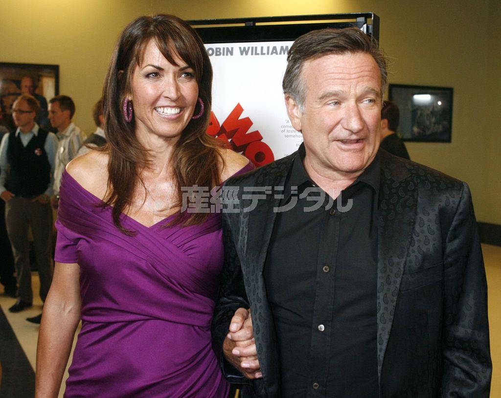 昨年８月に死去した米俳優、ロビン・ウィリアムズさん（右）と妻のスーザンさん＝２００９年８月１３日、米カリフォルニア州ロサンゼルス（ロイター）
