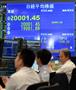 「２万円台」をつけた日経平均株価＝１０日午前、東京都千代田区の大和証券トレーディングルーム（大西史朗撮影）