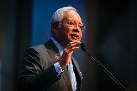 予算発表で会見するマレーシアのナジブ・ラザク首相。同国は２０１０年からＴＰＰ参加を検討している＝首都近郊プトラジャヤ（ＡＰ）