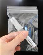 唾液を専用容器に入れ、キャップを閉めてから返信用封筒に入れてポストに投函