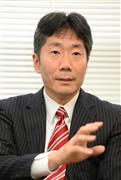 インタビューに応じる新生銀行の工藤英之氏＝東京・日本橋室町