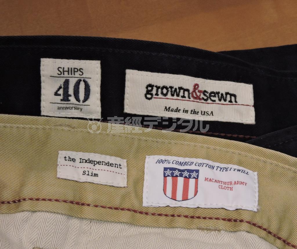 ｇｒｏｗｎ＆ｓｅｗｎ定番「インディペンデント＿スリム」と「マッカーサー」のネームタグ。ＳＨＩＰＳ創立４０周年での共同企画であることも記されている＝２０１５年５月２２日、東京都渋谷区のＳＨＩＰＳ渋谷店（東京都渋谷区）