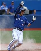 アストロズ戦の九回、生還するブルージェイズ・川崎宗則（むねのり）＝２０１５年６月７日、カナダ・オンタリオ州トロント（ゲッティ＝共同）
