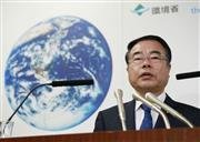 閣議後の記者会見で質問に答える望月環境相＝１２日午前、環境省