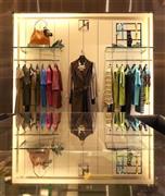 カラフルで洗練された都会的な夏を楽しむアイテムがそろう２０１５春夏コレクション。写真中央は上質でソフトなシープスキンを使用した型押しワンピース（４０万円）＝２０１５年６月１０日、東京都渋谷区（長尾みなみ撮影）