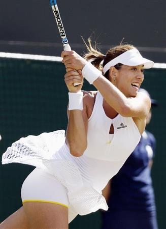 女子シングルスで４強入りしたガルビネ・ムグルサ＝２０１５年７月７日、英国・ウィンブルドン（共同）