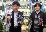 ガンプラの魅力などについて語る柿谷太一朗さん（左）と馬場俊明さん