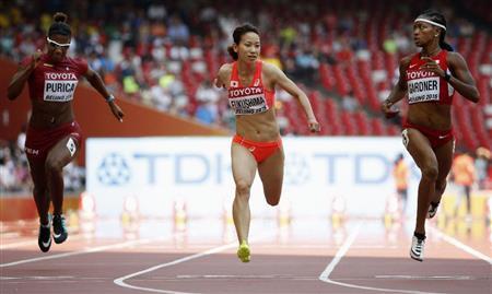 女子１００メートル予選準決勝進出を決めた福島千里（中央）＝２０１５年８月２３日、中国・首都北京市（共同）