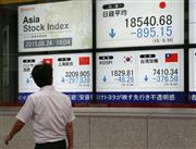 アジア各地の株価を示すボード。世界同時株安の連鎖が続き、日経平均株価も含めて軒並み大幅に下落した＝２４日午後、東京都中央区