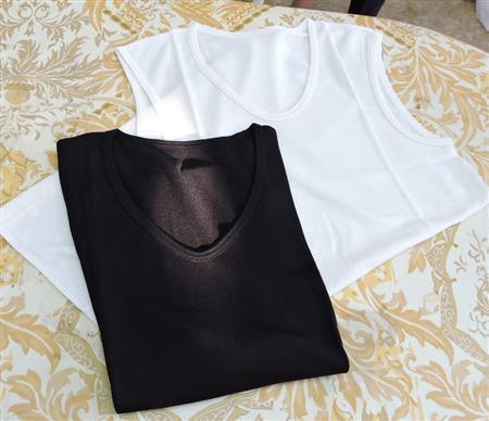 「みの紙舞」では和紙糸を織った布でさまざまな衣料を試作している。実際にイベントで使われたはっぴ＝２０１５年８月１１日、岐阜県美濃市（藤沢志穂子撮影）