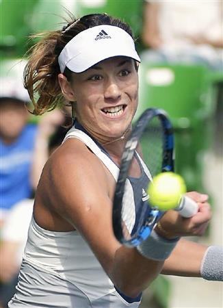 準々決勝進出を決めたガルビネ・ムグルサ＝２０１５年９月２３日、東京都江東区の有明テニスの森公園（共同）