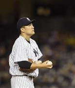 一回、連打を浴びて厳しい表情の田中将大（まさひろ）＝２０１５年９月３０日、米ニューヨーク（共同）