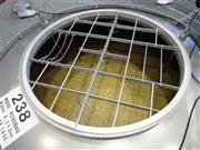 酒母にサツマイモと霧島裂罅水（れっかすい）を混ぜて、さらに熟成させる。サツマイモを入れたため、１次仕込みより黄色くなる＝２０１５年１０月７日、宮崎県都城市（竹中岳彦撮影）