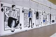 東京・新宿駅の地下街に登場したジャスティン・テオドロ画のトランプの広告、メンズ版＝２０１５年１１月２３日、東京都新宿区（藤沢志穂子撮影）
